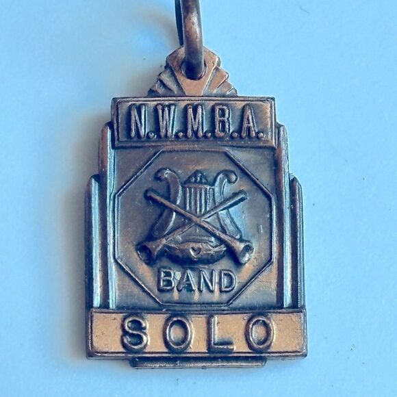 Vintage bronze tone N.W.M.B.A. Band SOLO pendant/medal/charm - Picture 1 of 2